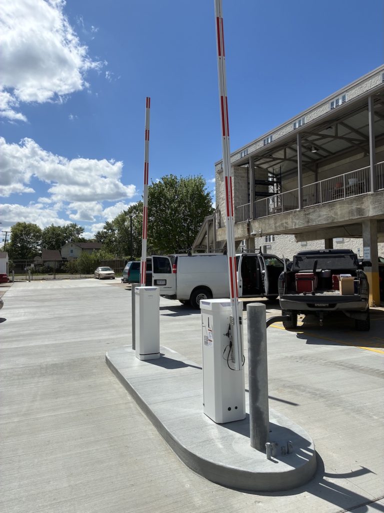 Barrier gates swung up in front of multi-story building